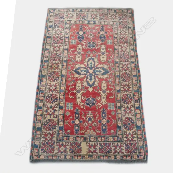 A hand knotted Baluchi rug