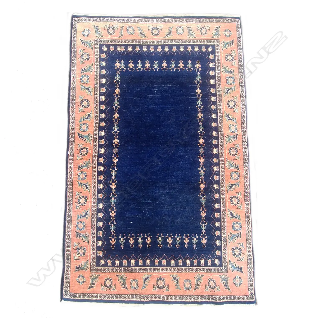 A hand knotted Persian rug Image 1++