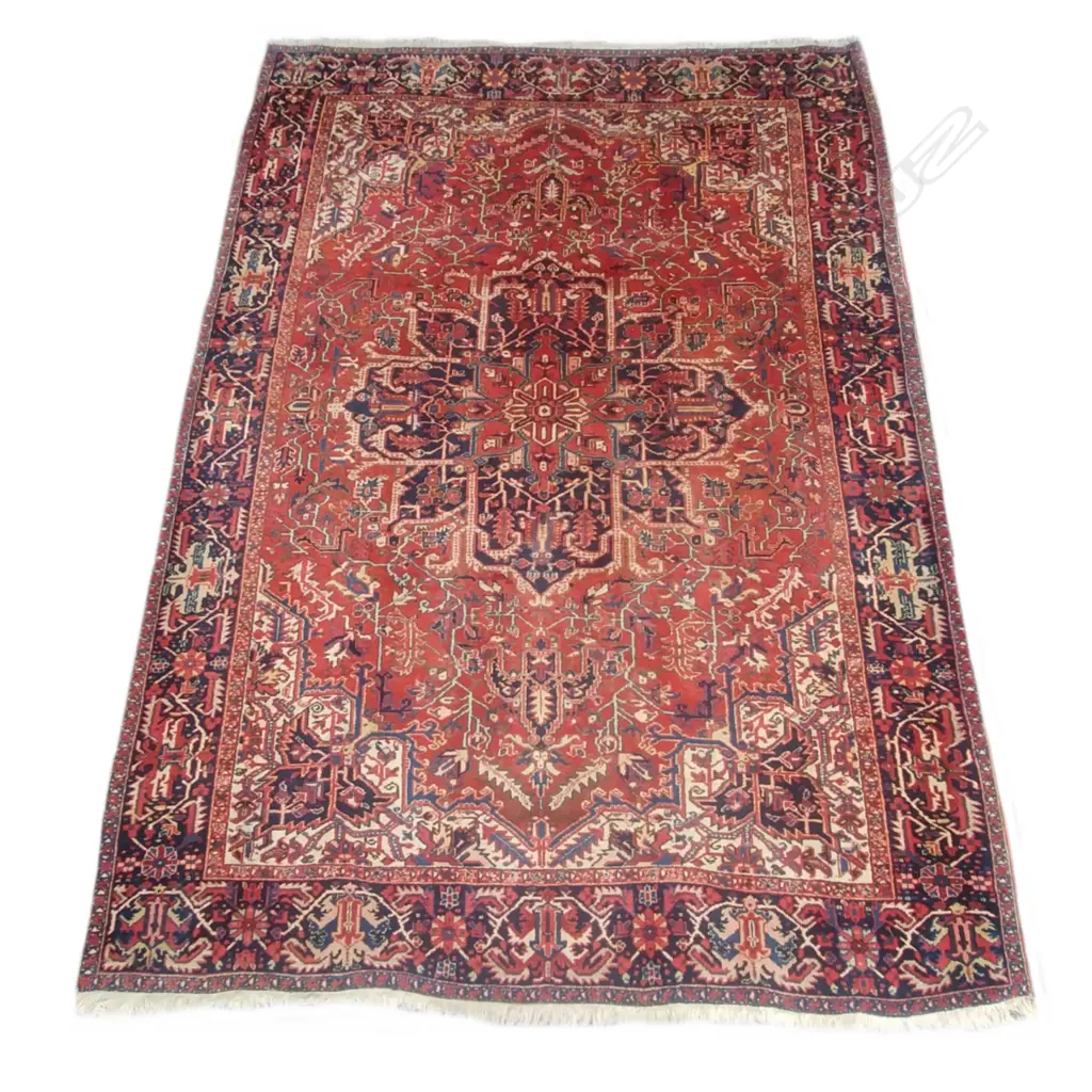 A large hand knotted Persian rug Image 1++