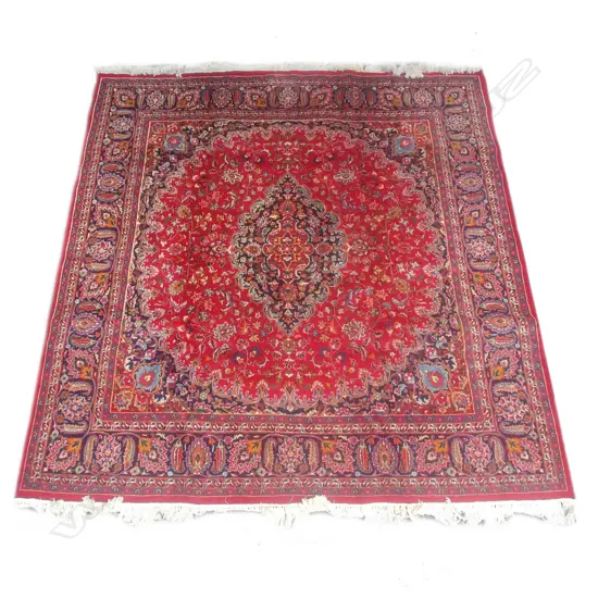 A hand knotted Iranian Mashad carpet