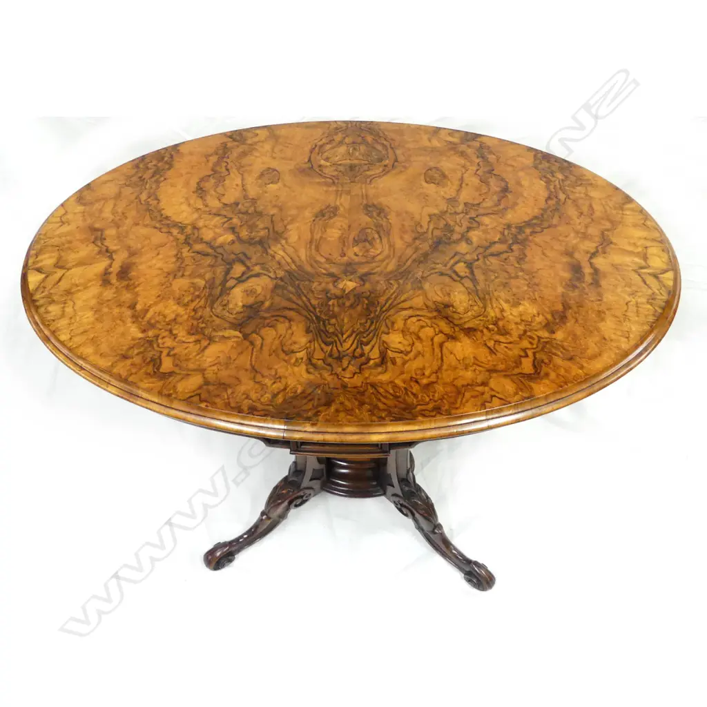 A Victorian oval walnut side table Image 1++
