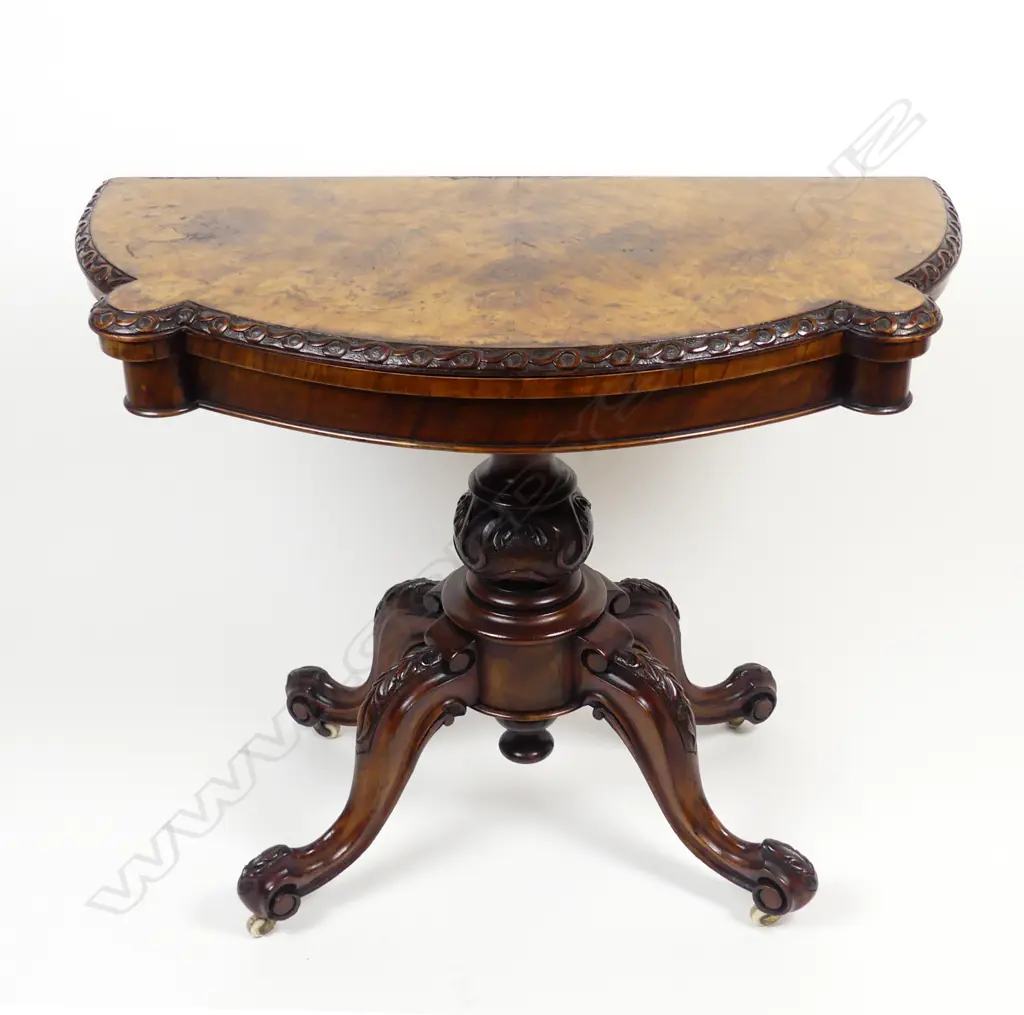 A Victorian walnut card table Image 1++