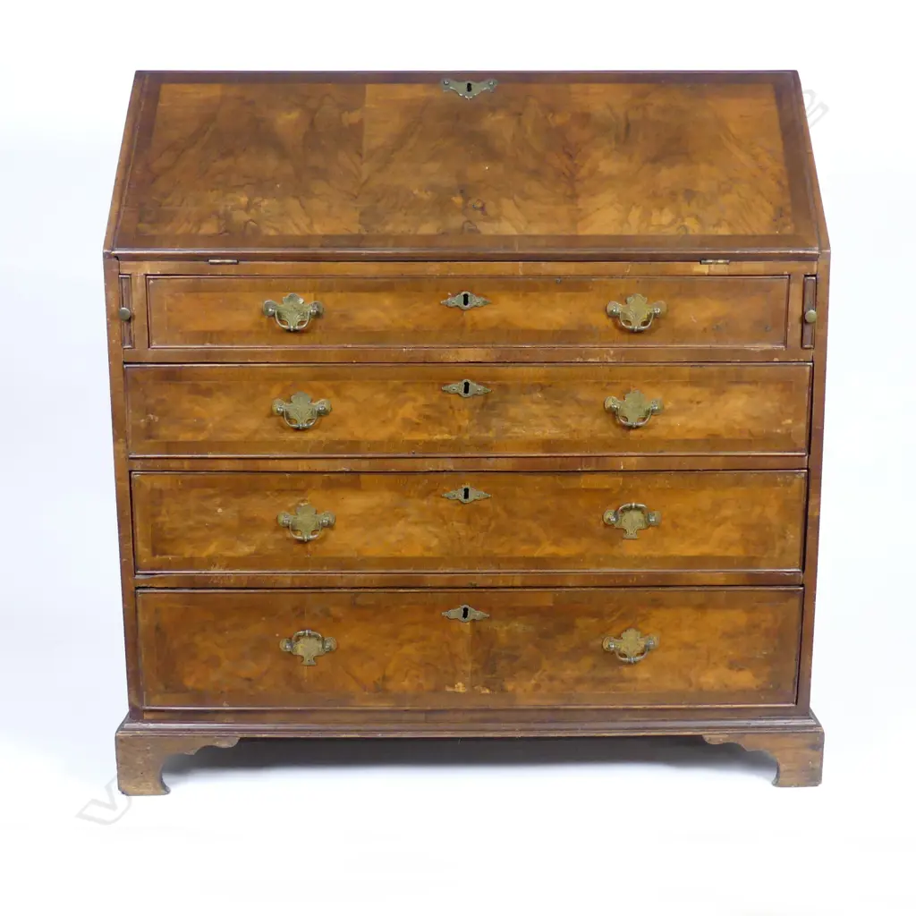 A Georgian walnut drop front bureau Image 1++