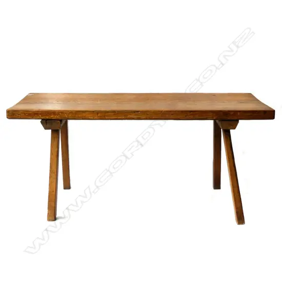 A rustic pine console table