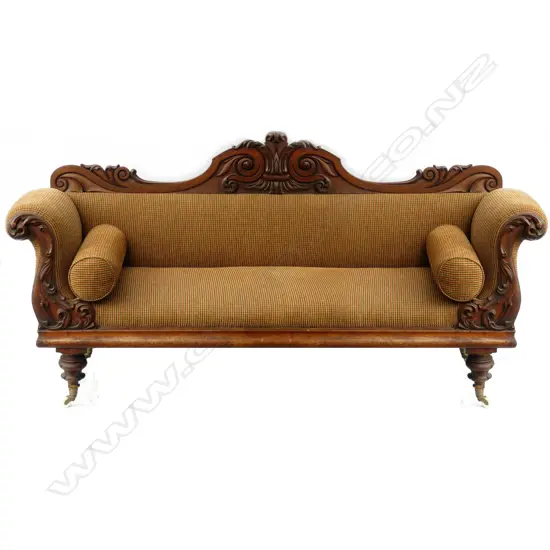 A Victorian mahogany sofa