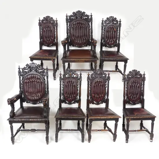 Seven Victorian baronial oak dining chairs