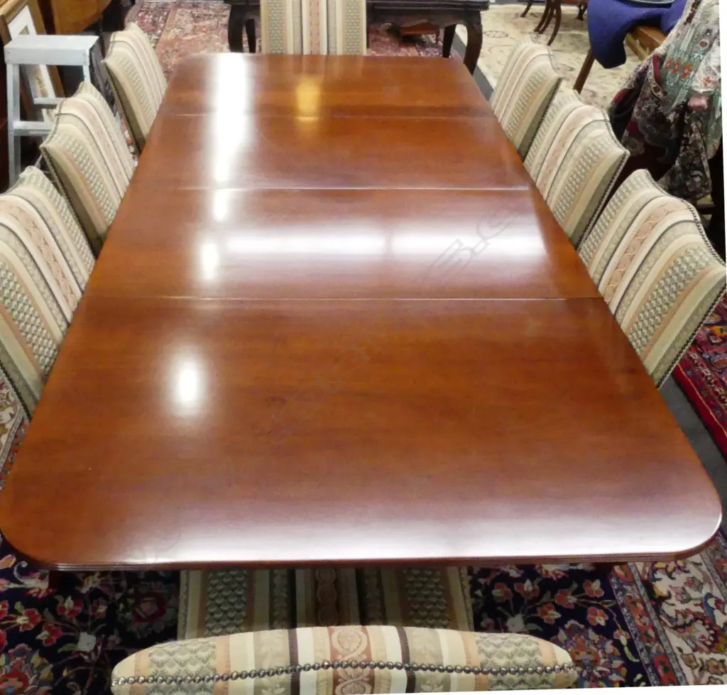 A mahogany Regency style double pedestal extension dining table Image 1++