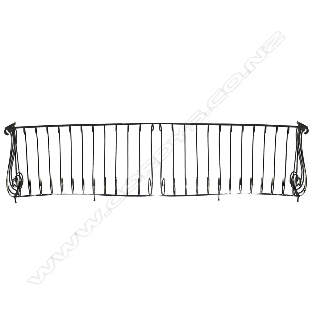 A long vintage scrolling iron long deck balustrade Image 1++