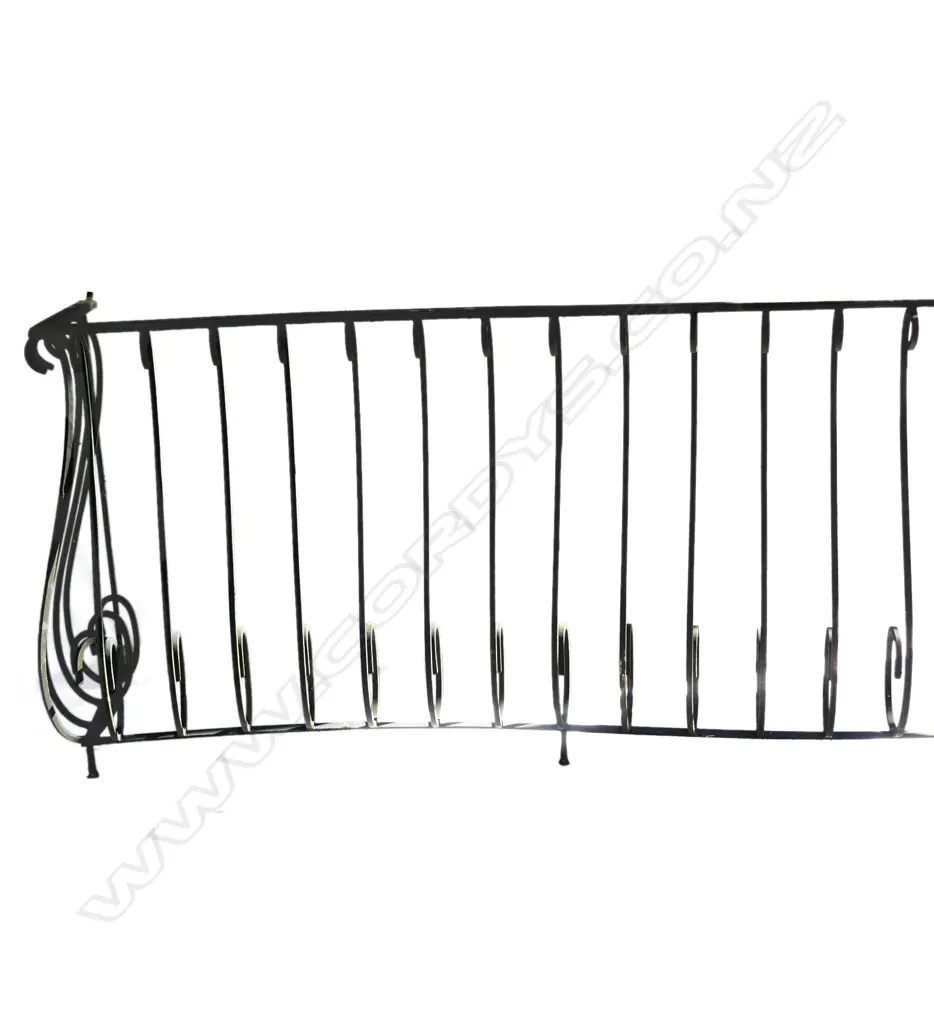 A long vintage scrolling iron long deck balustrade Image 1++