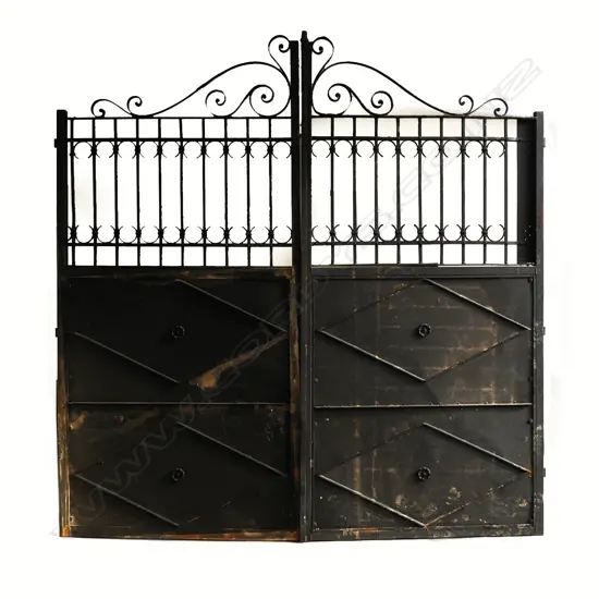 A pair of vintage classical large and impressive driveway gates