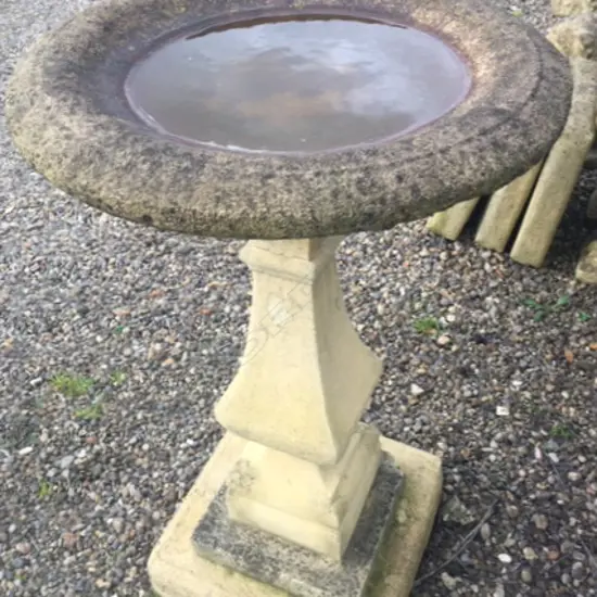 A classical Haddonstone birdbath