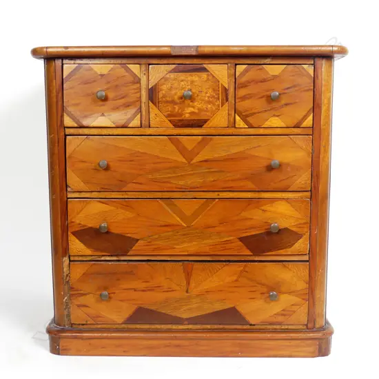 A colonial mottled kauri apprentice chest