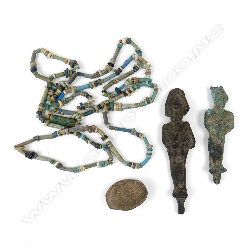 A collection of four old Egyptian artefacts Image 1++