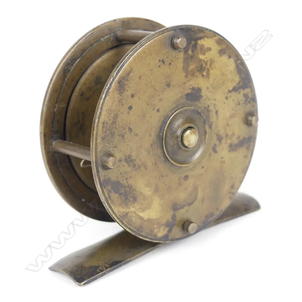 A late 19thC 2¼" brass reel Image 1++