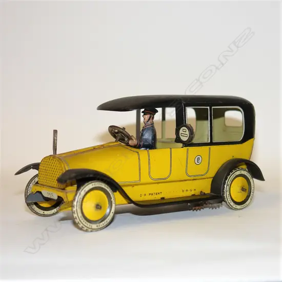 An uncommon c.1920 Lehmann #755 tinplate yellow cab taxi