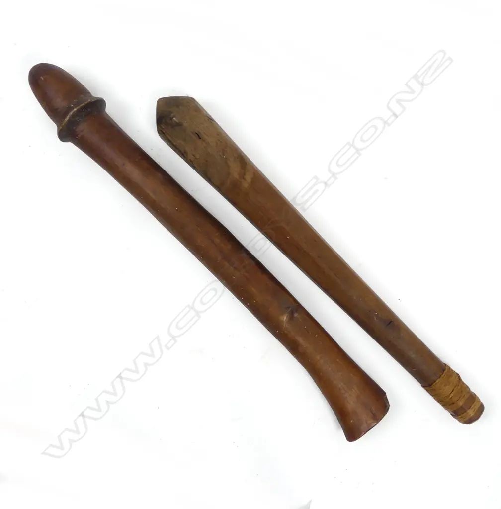A Vanuatuan penis shaped club and a Tongan seven-sided club Image 1++
