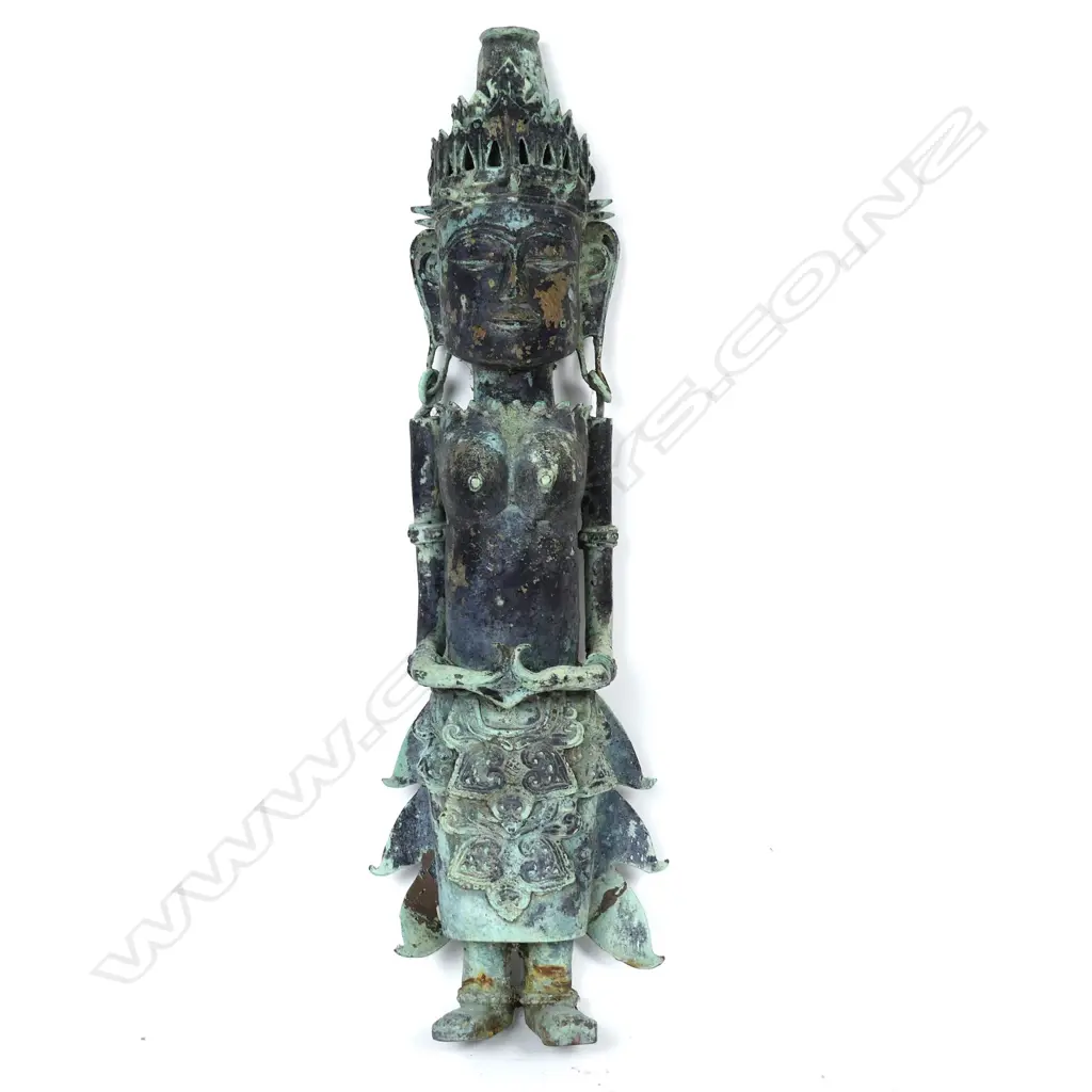 A standing bronze figure of a woman Image 1++