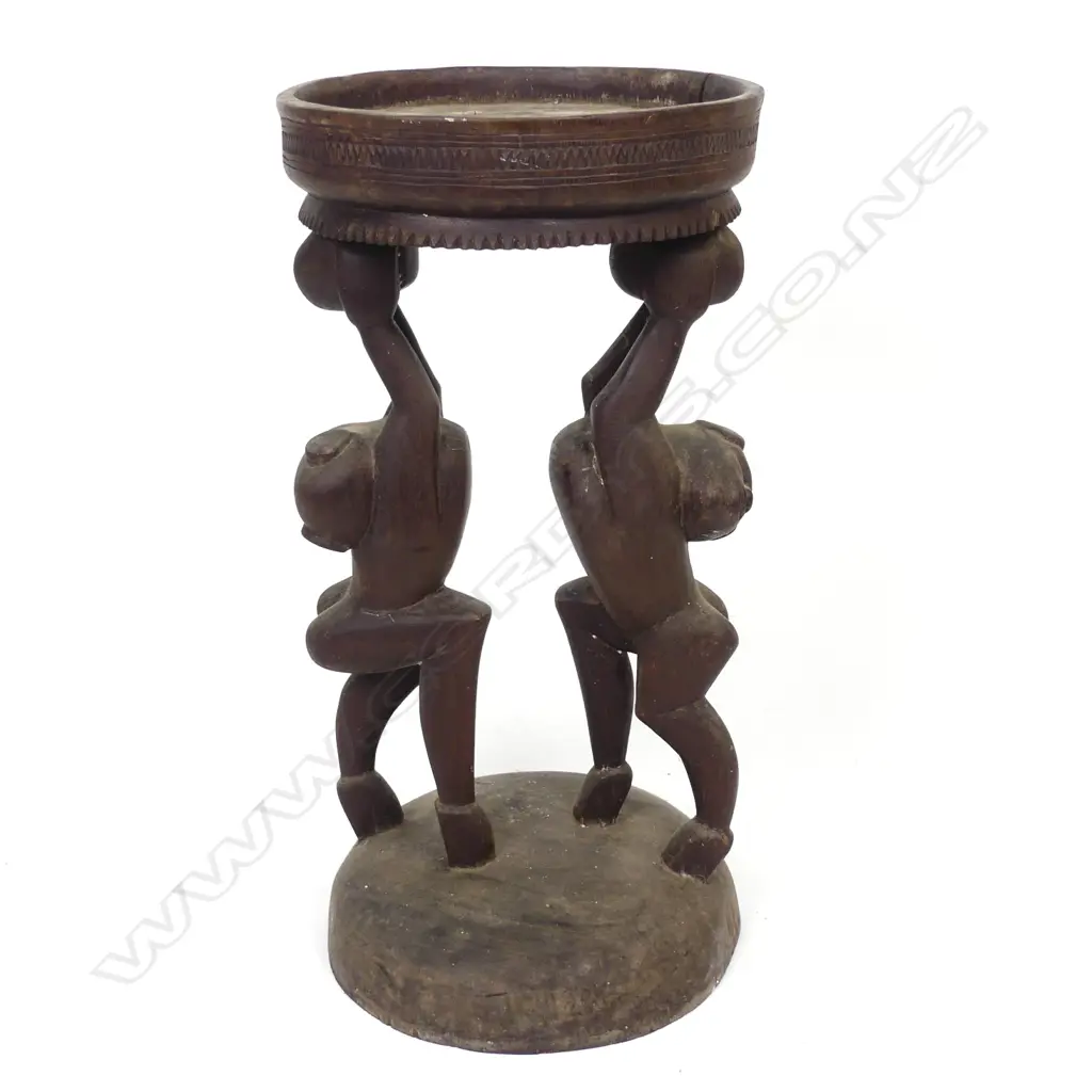 A Trobriand Island hardwood stool Image 1++