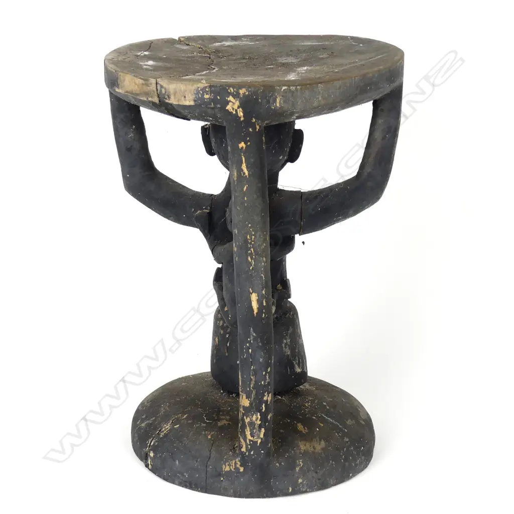 A Melanesian carved wood stool Image 1++