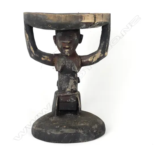 A Melanesian carved wood stool