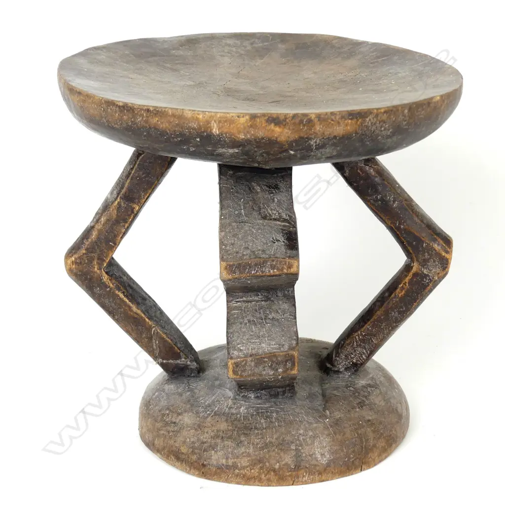 An African carved stool (tonga) Image 1++