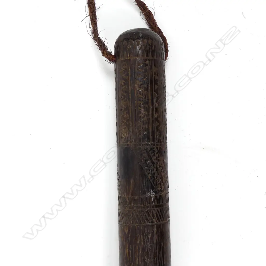 A coconut wood short pole club (bowai) Image 1++