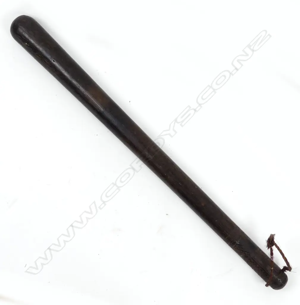 A coconut wood short pole club (bowai) Image 1++