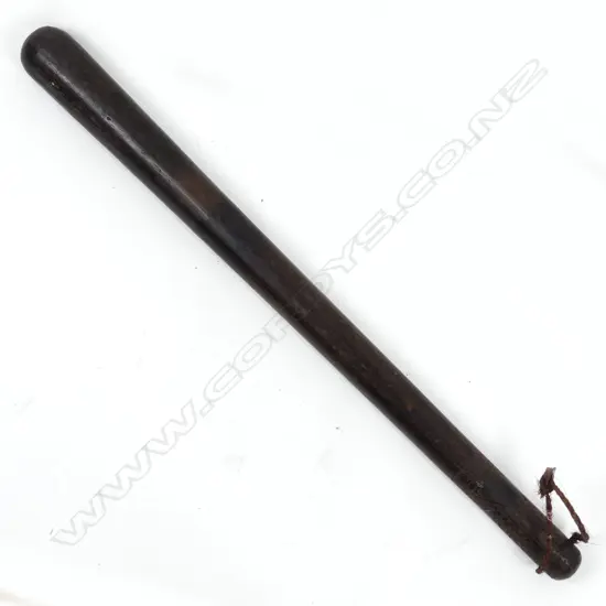 A coconut wood short pole club (bowai)