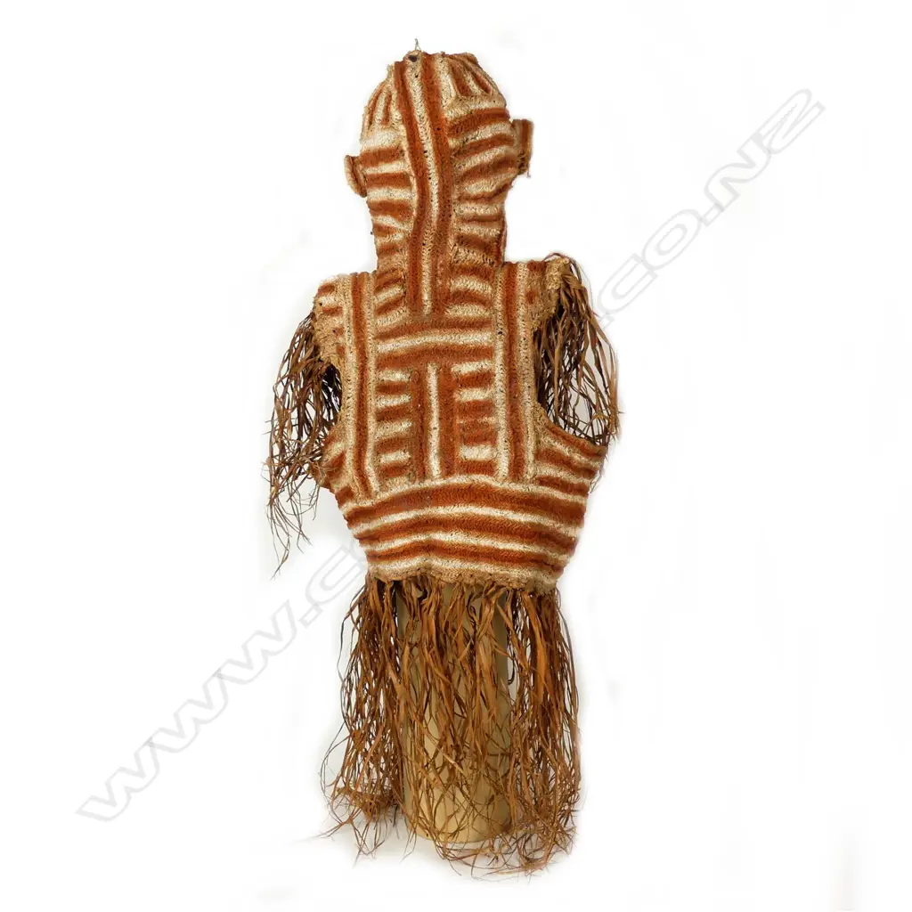 An Asmat ceremonial dance costume Image 1++