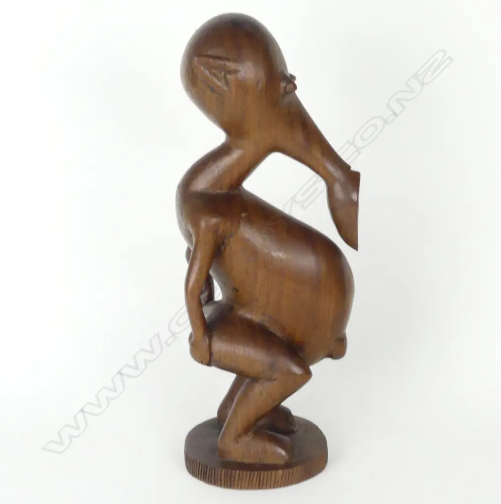 An unusual early/mid-20thC Indonesian tribal heavy hardwood carved figure Image 1++