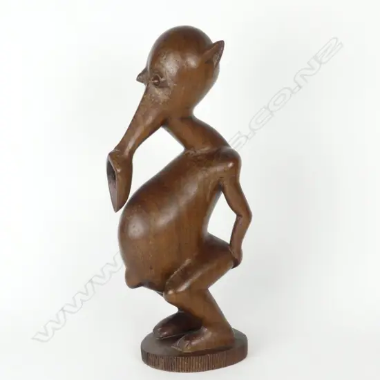 An unusual early/mid-20thC Indonesian tribal heavy hardwood carved figure