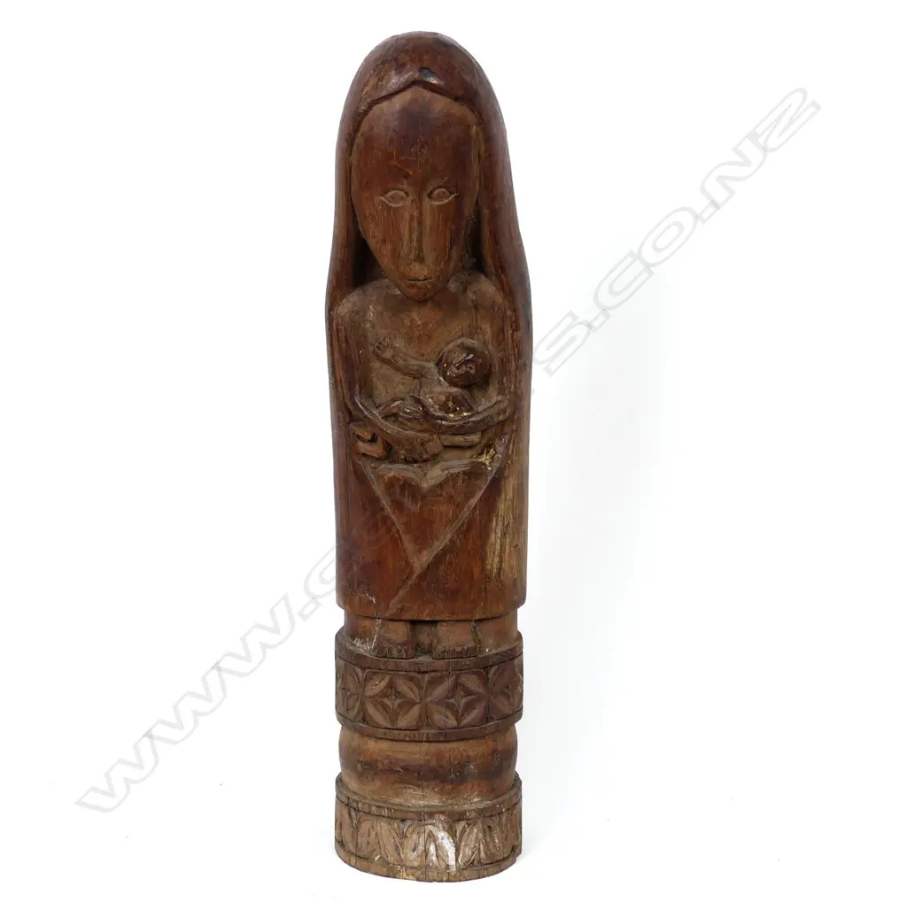 A hardwood carved West Timorese statuette of a Madonna and child Image 1++