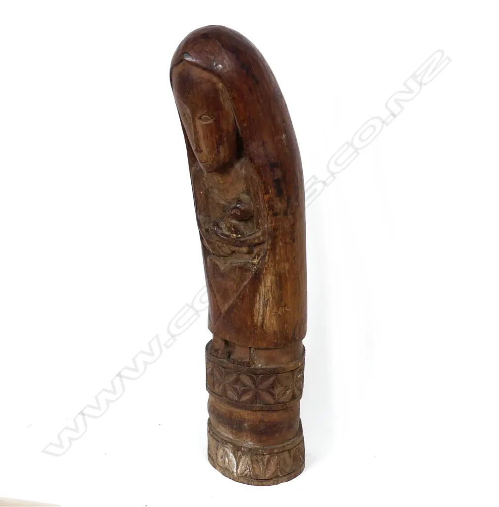 A hardwood carved West Timorese statuette of a Madonna and child Image 1++
