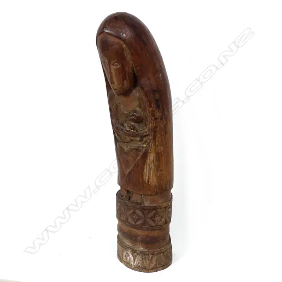 A hardwood carved West Timorese statuette of a Madonna and child