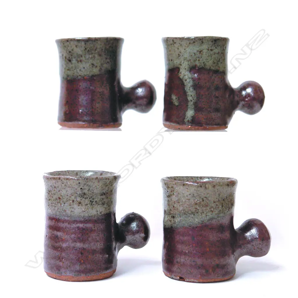 A set of four Barry Brickell knob handled small coffee mugs Image 1++