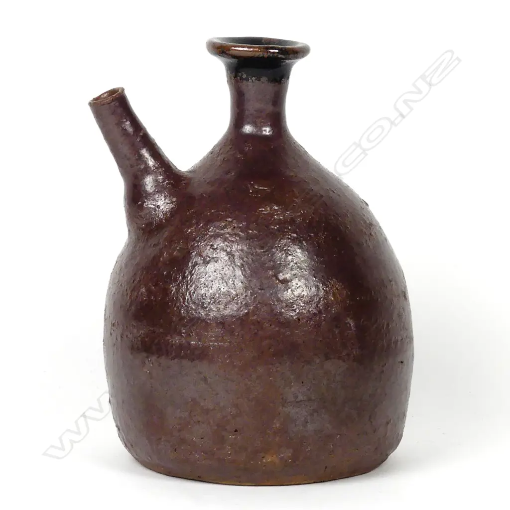 Barry Brickell pouring wine flagon Image 1++