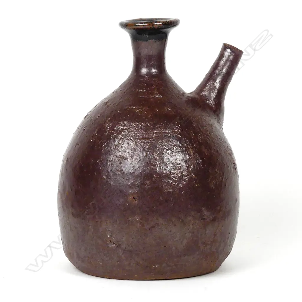 Barry Brickell pouring wine flagon Image 1++
