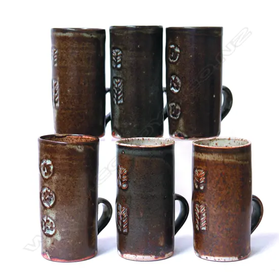 A set of six Len Castle tall narrow coffee mugs