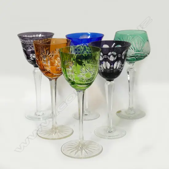 A harlequin set of six coloured wine glasses