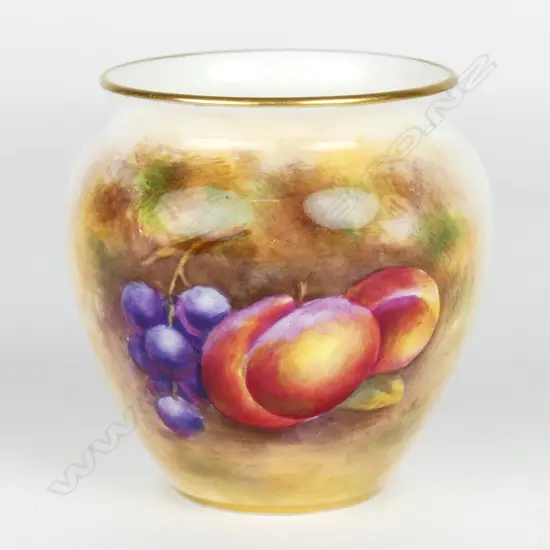 A Royal Worcester vase painted with fruit