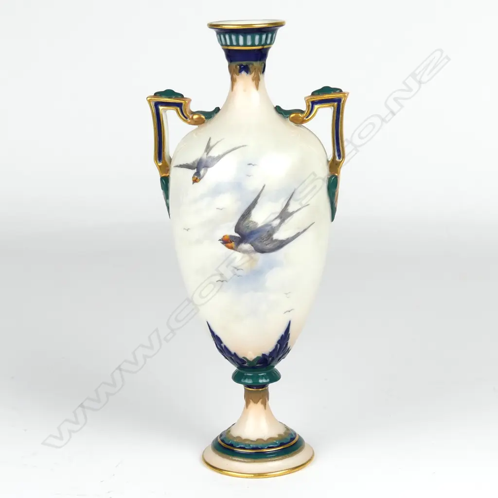 A small Royal Worcester two handled vase Image 1++