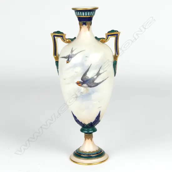 A small Royal Worcester two handled vase