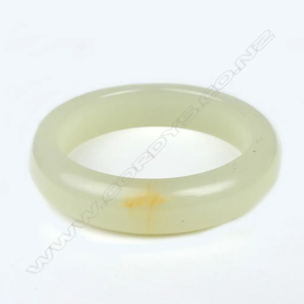 An old Chinese 'mutton fat' jade bangle Image 1++