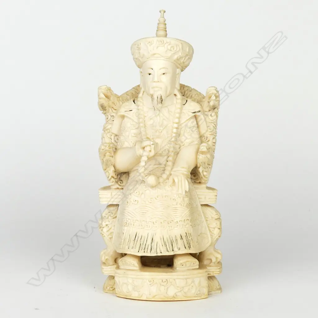 A Chinese old carved ivory figure of a seated emperor Image 1++