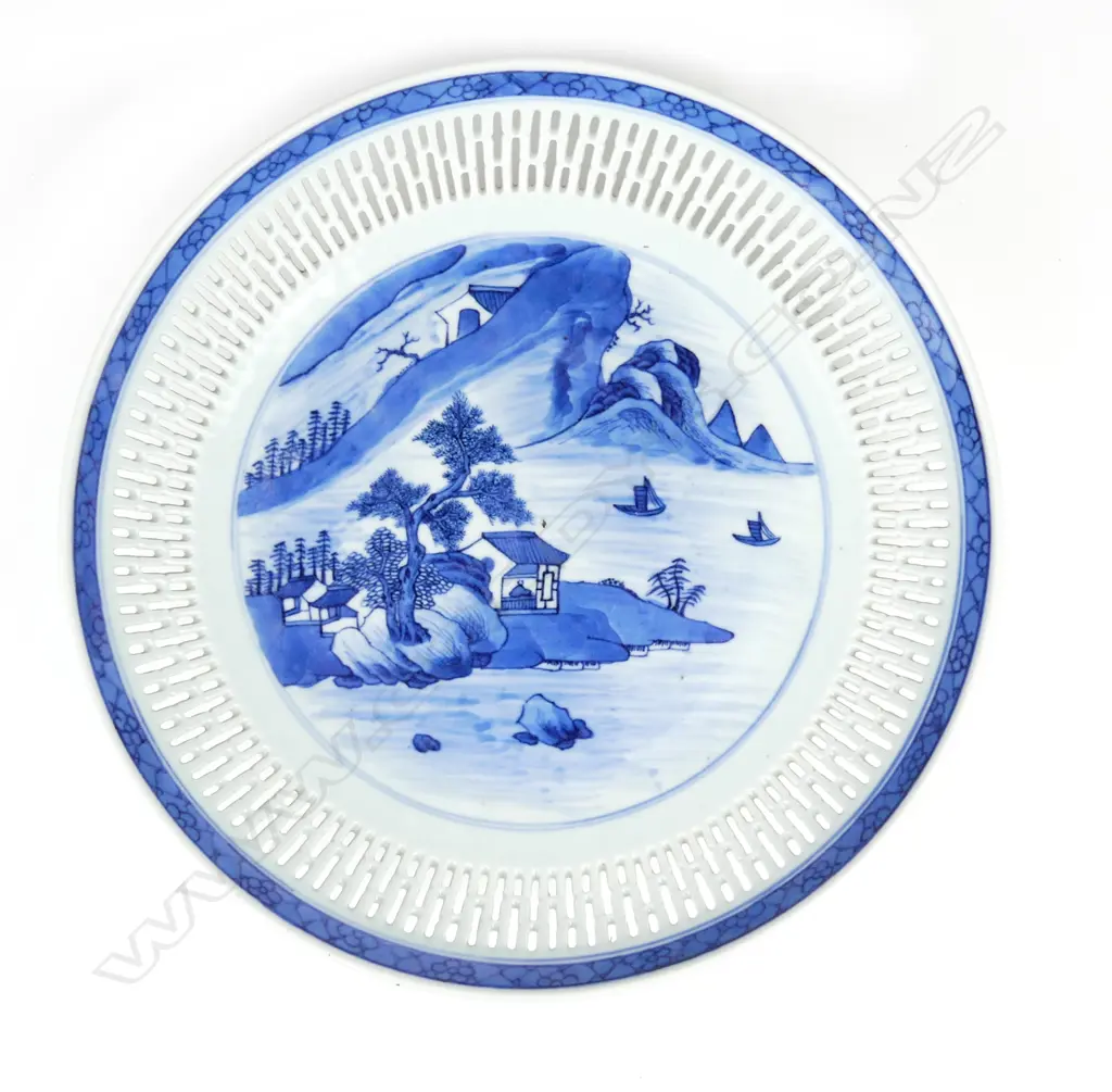 A Chinese Daoguang reticulated and blue and white painted dish Image 1++