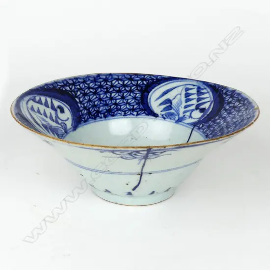An old Chinese blue and white flared bowl