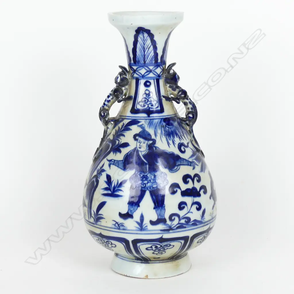 A Chinese blue and white baluster form vase Image 1++