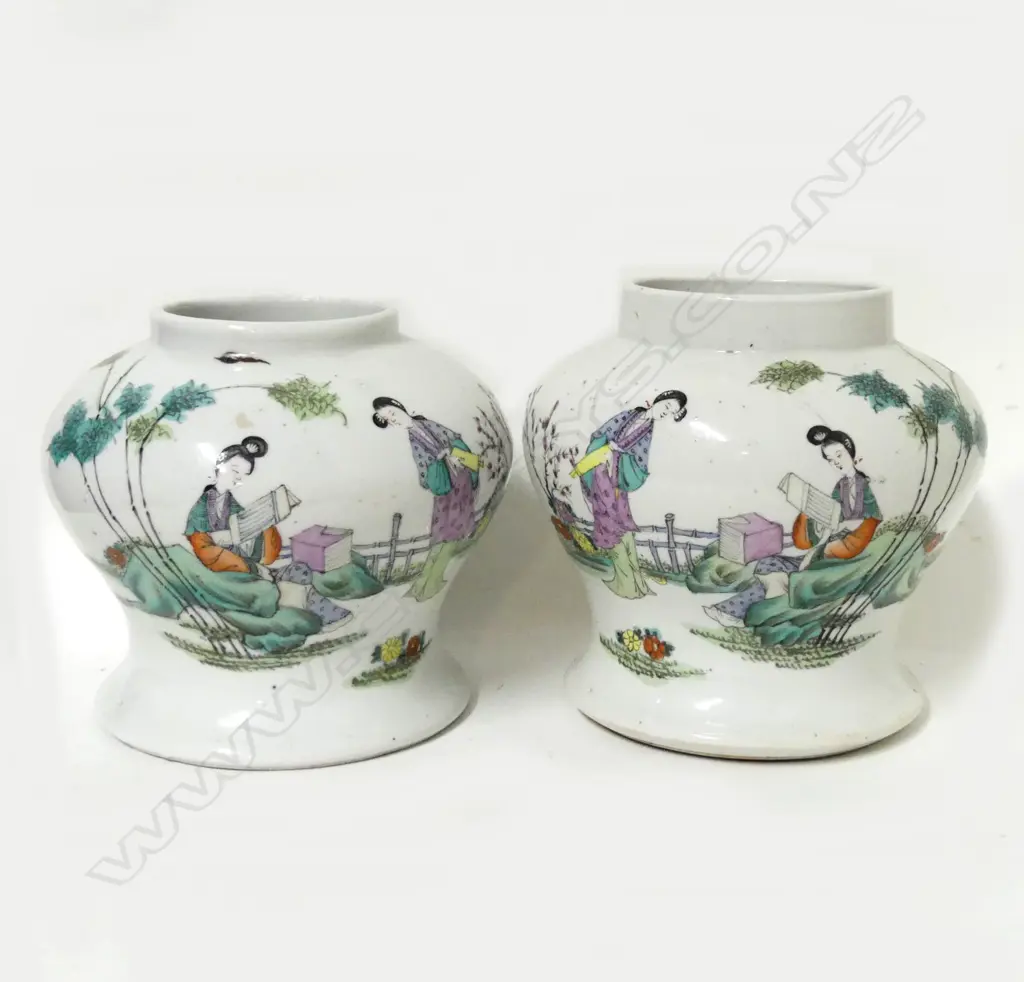 A pair of Chinese porcelain squat inverse baluster vases Image 1++