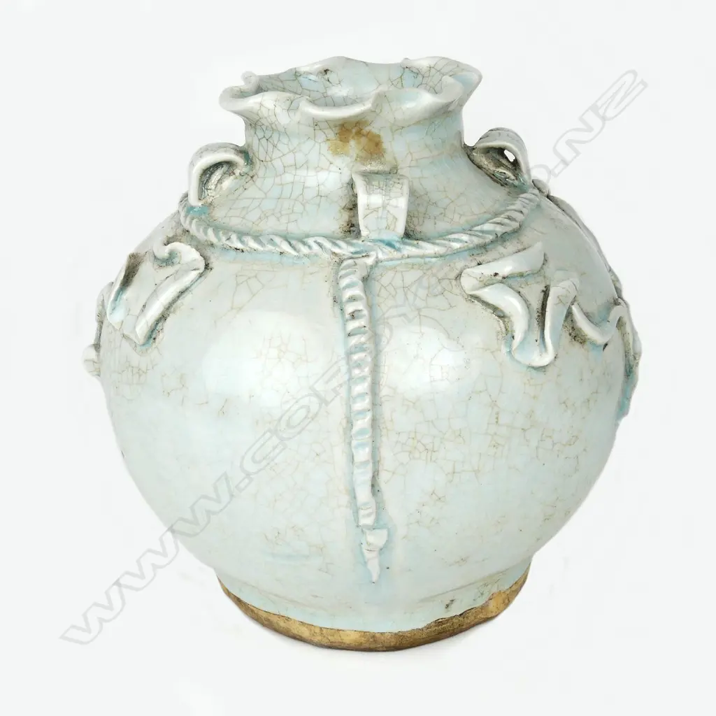 An Oriental celadon glazed spherical vase Image 1++