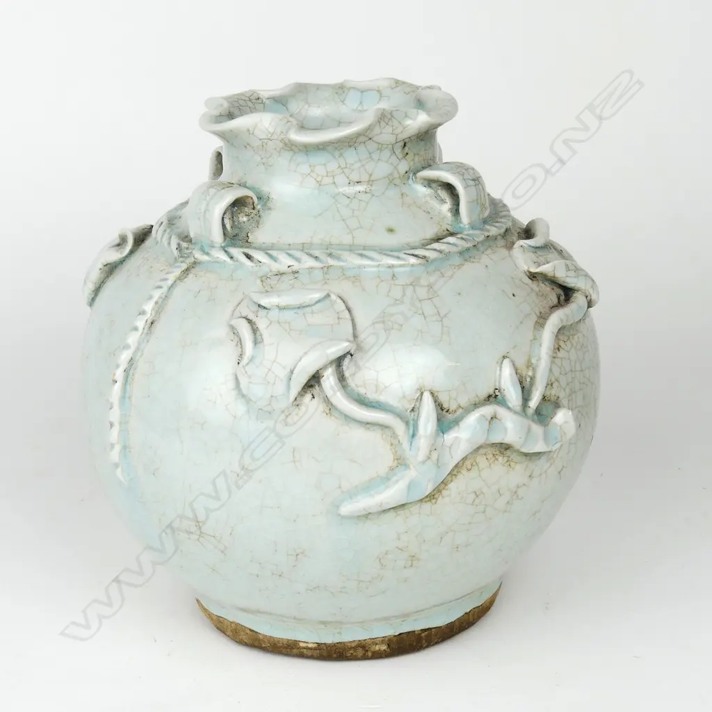 An Oriental celadon glazed spherical vase Image 1++
